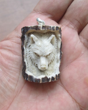 Wolf Carved Bone Pendants in Antler