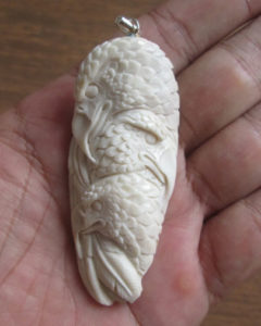 Eagle Group Carved Bone Pendant