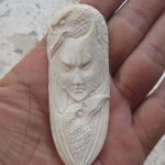 Wolf Mask Goddess Ravens Carved Bone Pendant