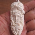 Goddess Horse Wolf Carved Bone Pendant