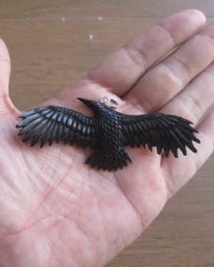 Raven Carved Bone Pendant