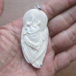 Moon Howling Wolf Carved Bone Pendant