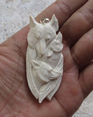 Wolf Group Carved Bone Pendant
